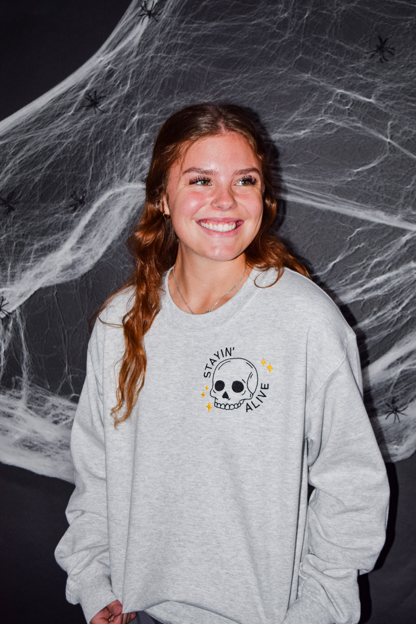 STAYIN' ALIVE EMBROIDERED SWEATER