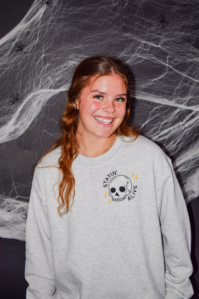 STAYIN' ALIVE EMBROIDERED SWEATER