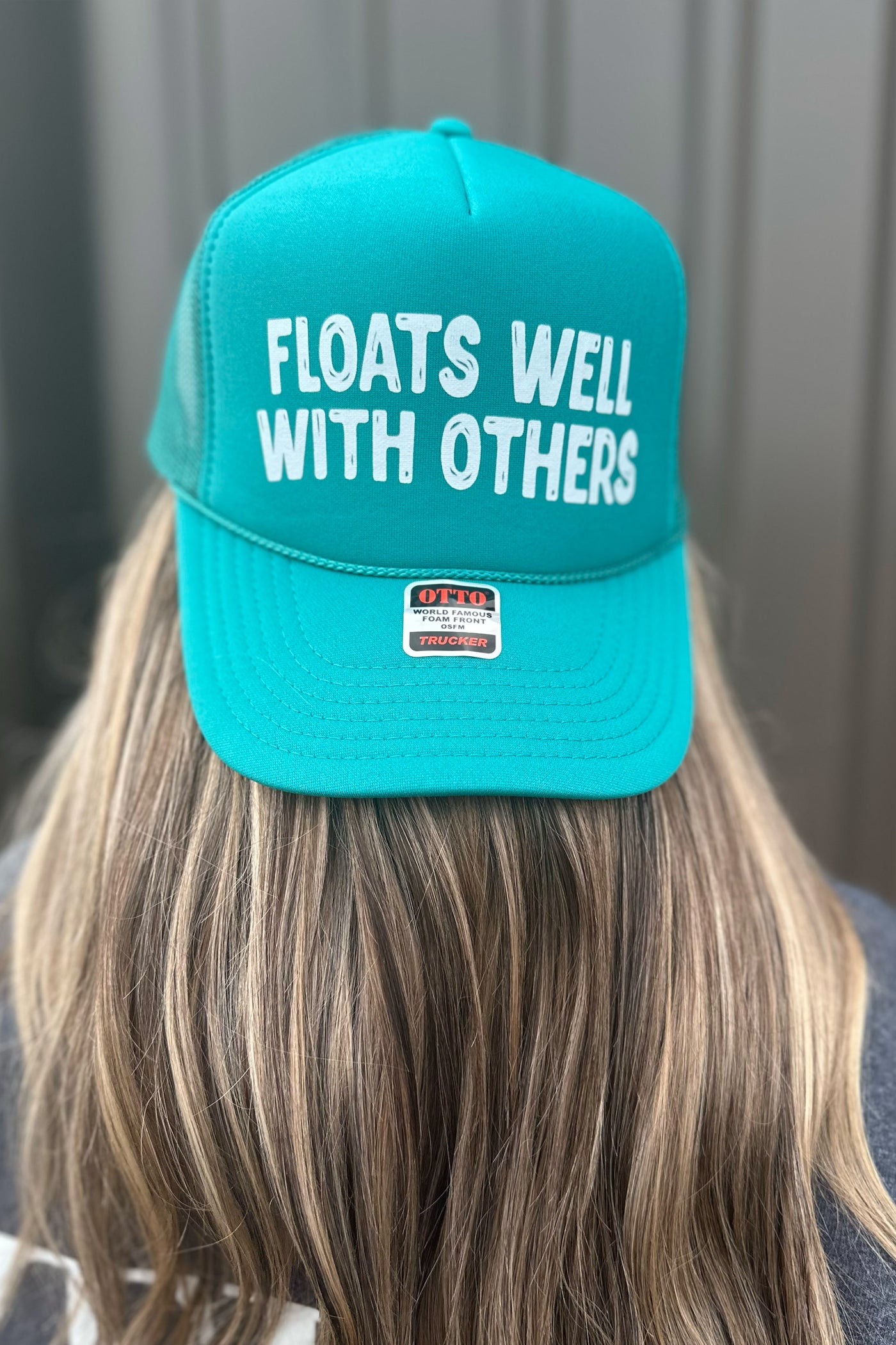 FLOATS WELL WITH OTHERS TRUCKER HAT