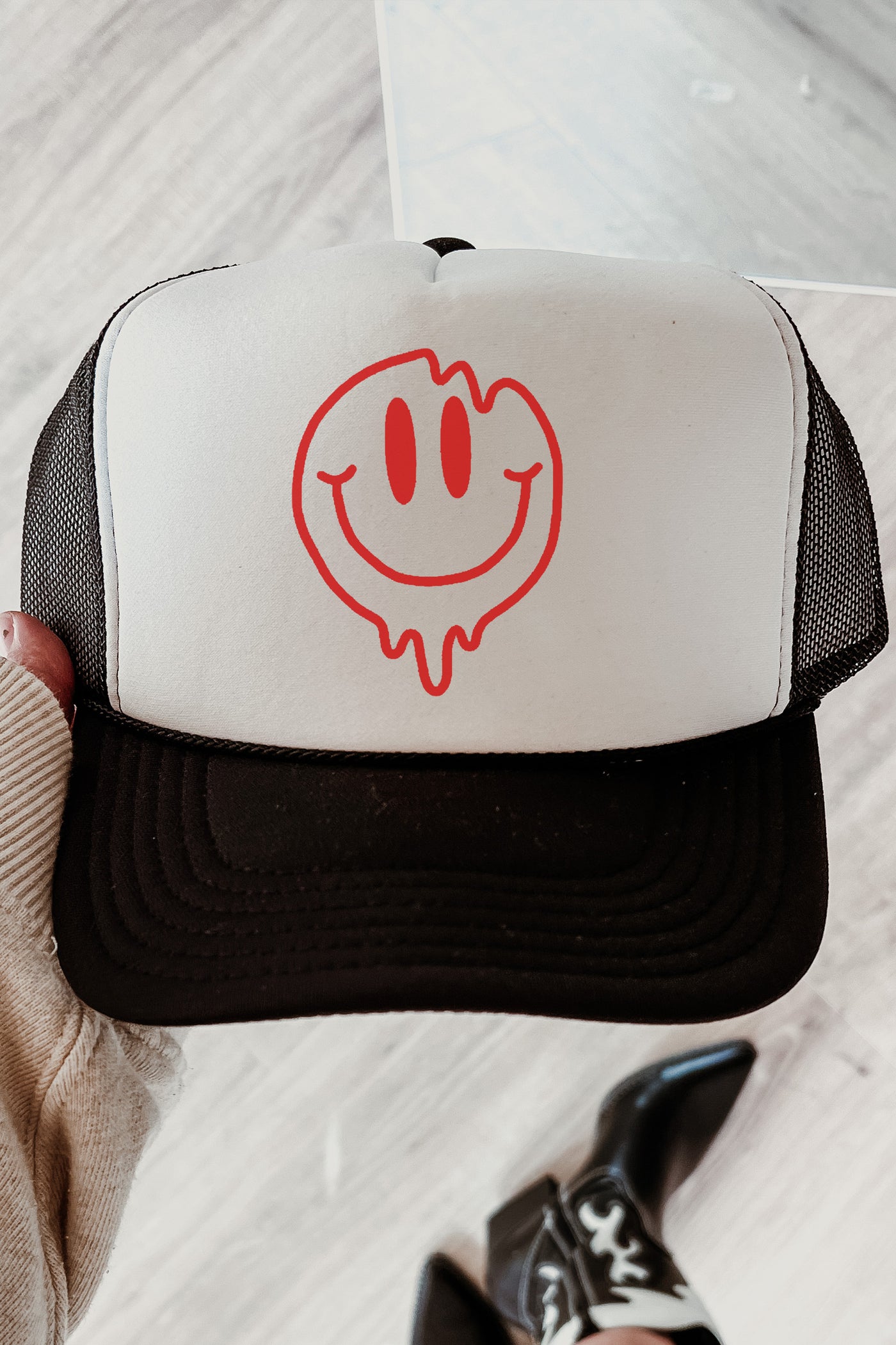 MELTING SMILEY FACE TRUCKER CAP
