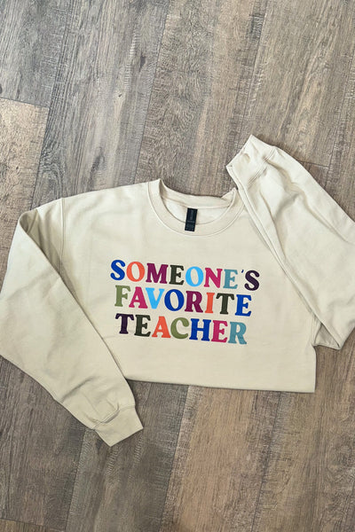 SOMEONE'S FAVORITE TEACHER GRAPHIC SWEATER