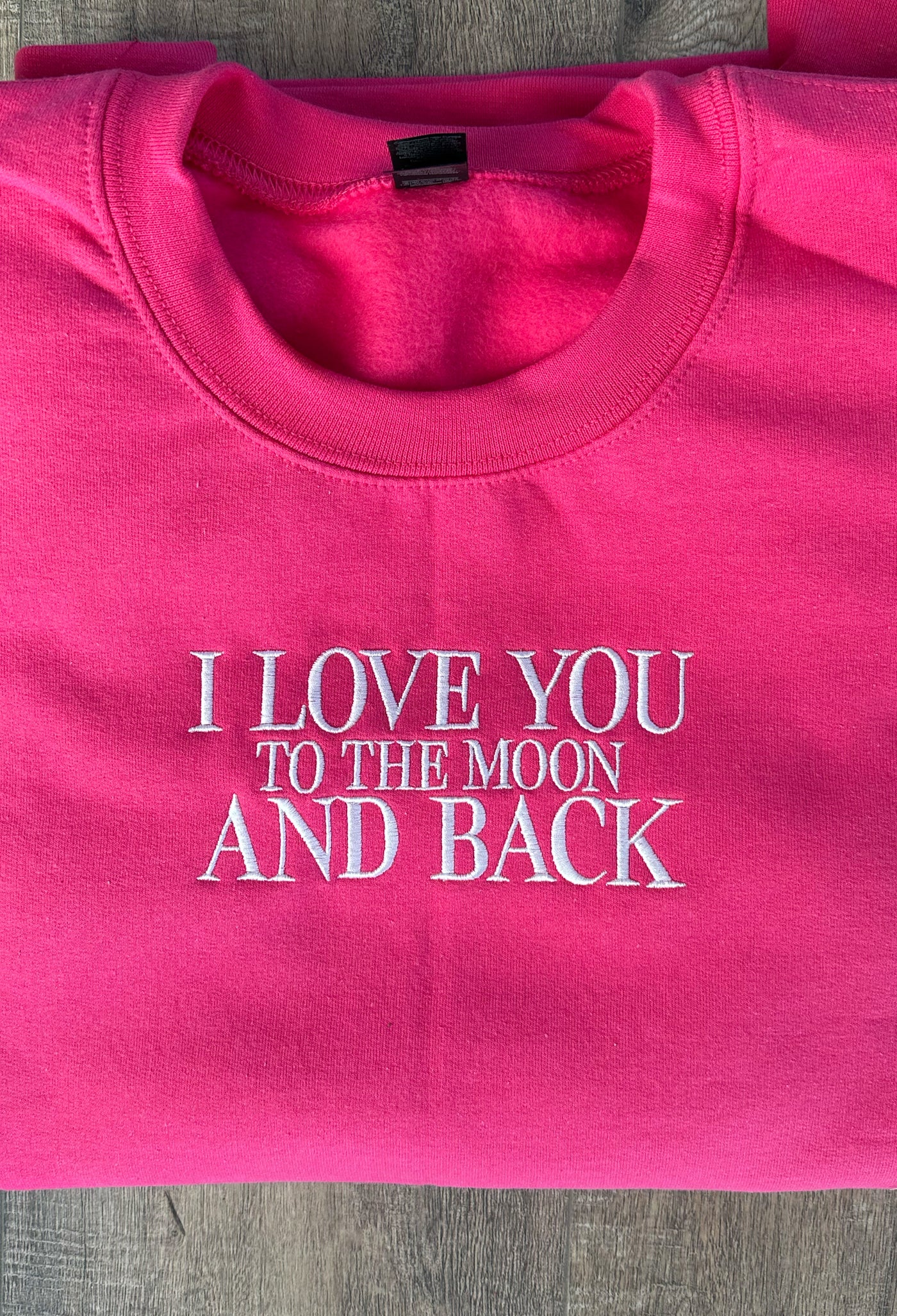 I LOVE YOU TO THE MOON AND BACK EMBROIDERED SWEATER