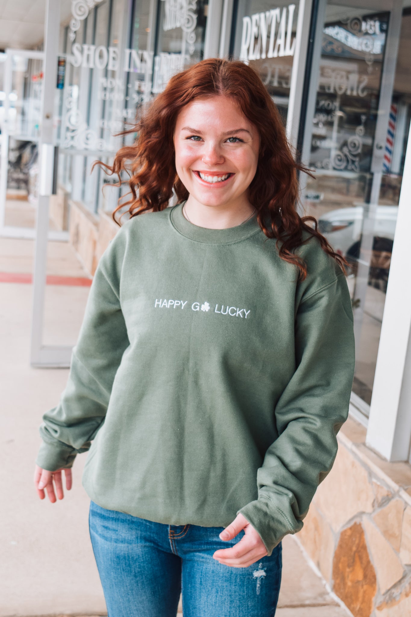 HAPPY GO LUCKY EMBROIDERED SWEATER