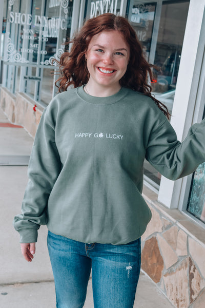 HAPPY GO LUCKY EMBROIDERED SWEATER