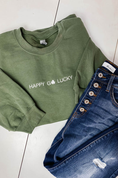 HAPPY GO LUCKY EMBROIDERED SWEATER