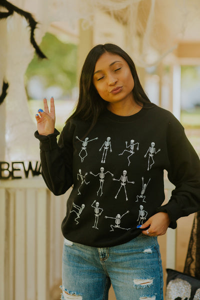 DANCING SKELETONS SWEATER