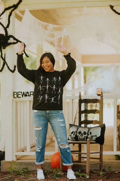 DANCING SKELETONS SWEATER