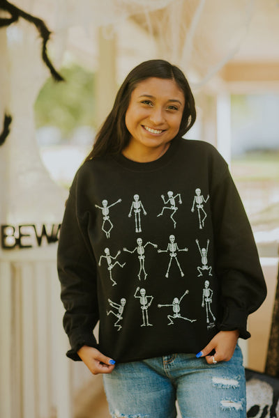 DANCING SKELETONS SWEATER