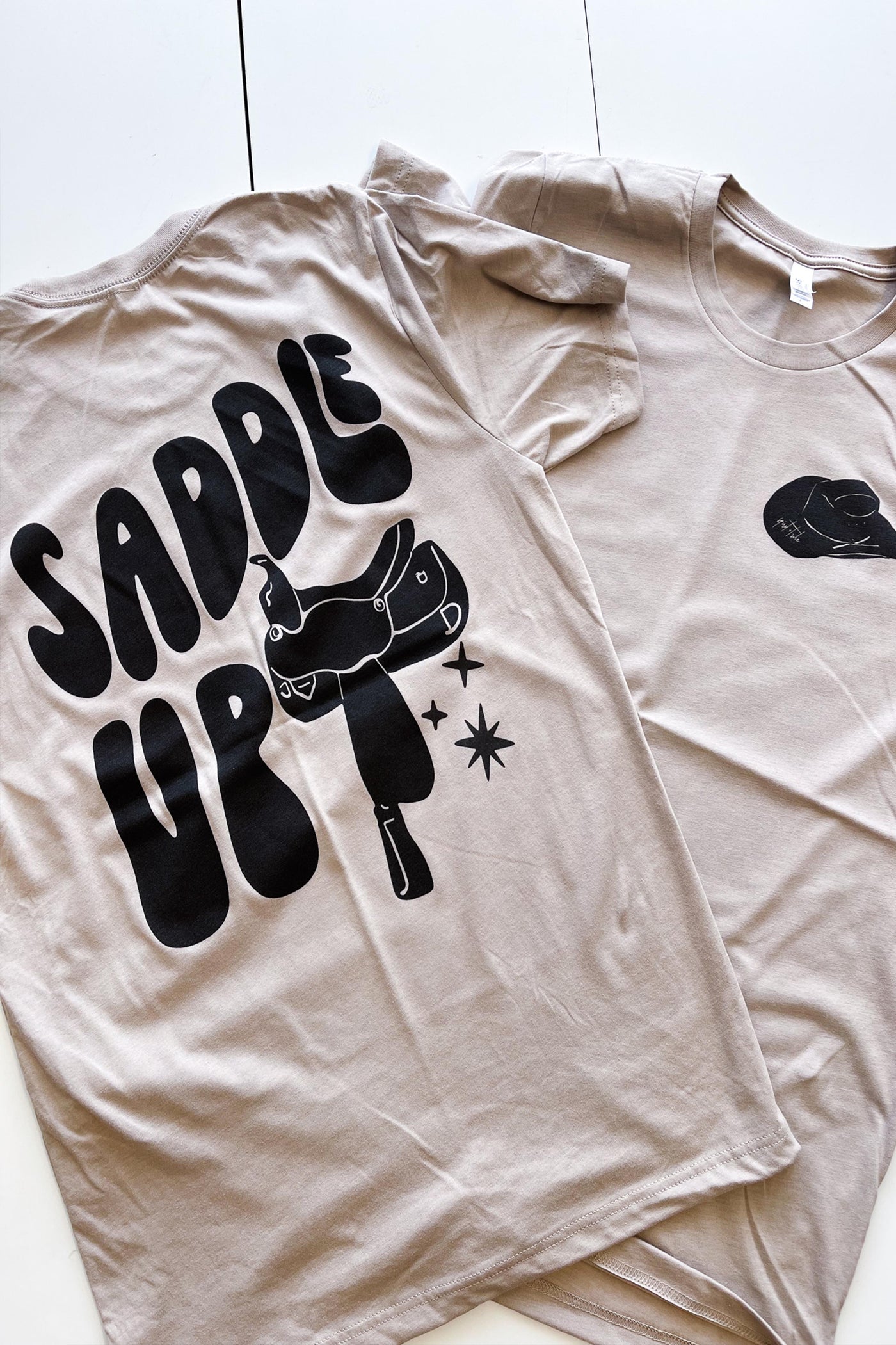 SADDLE UP